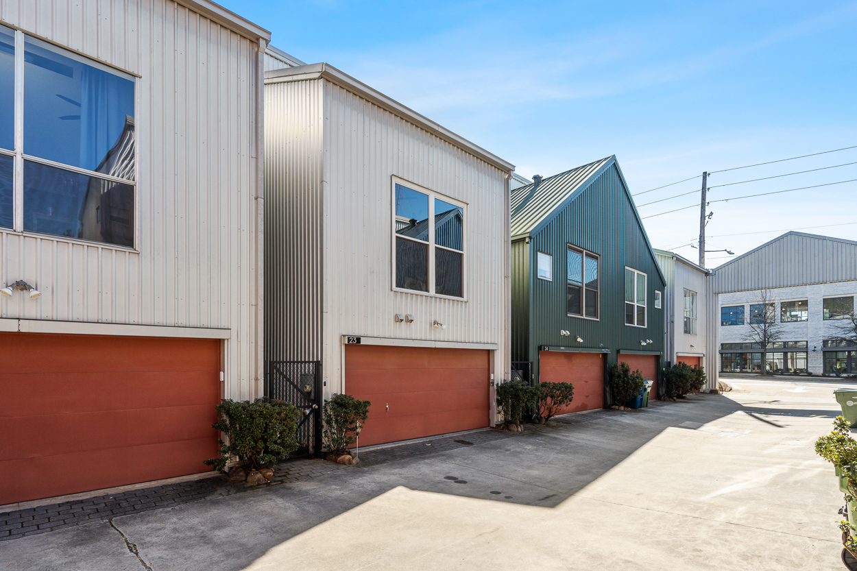 Two-car EV-ready garage with epoxy floors at 930 Memorial Drive Unit 23