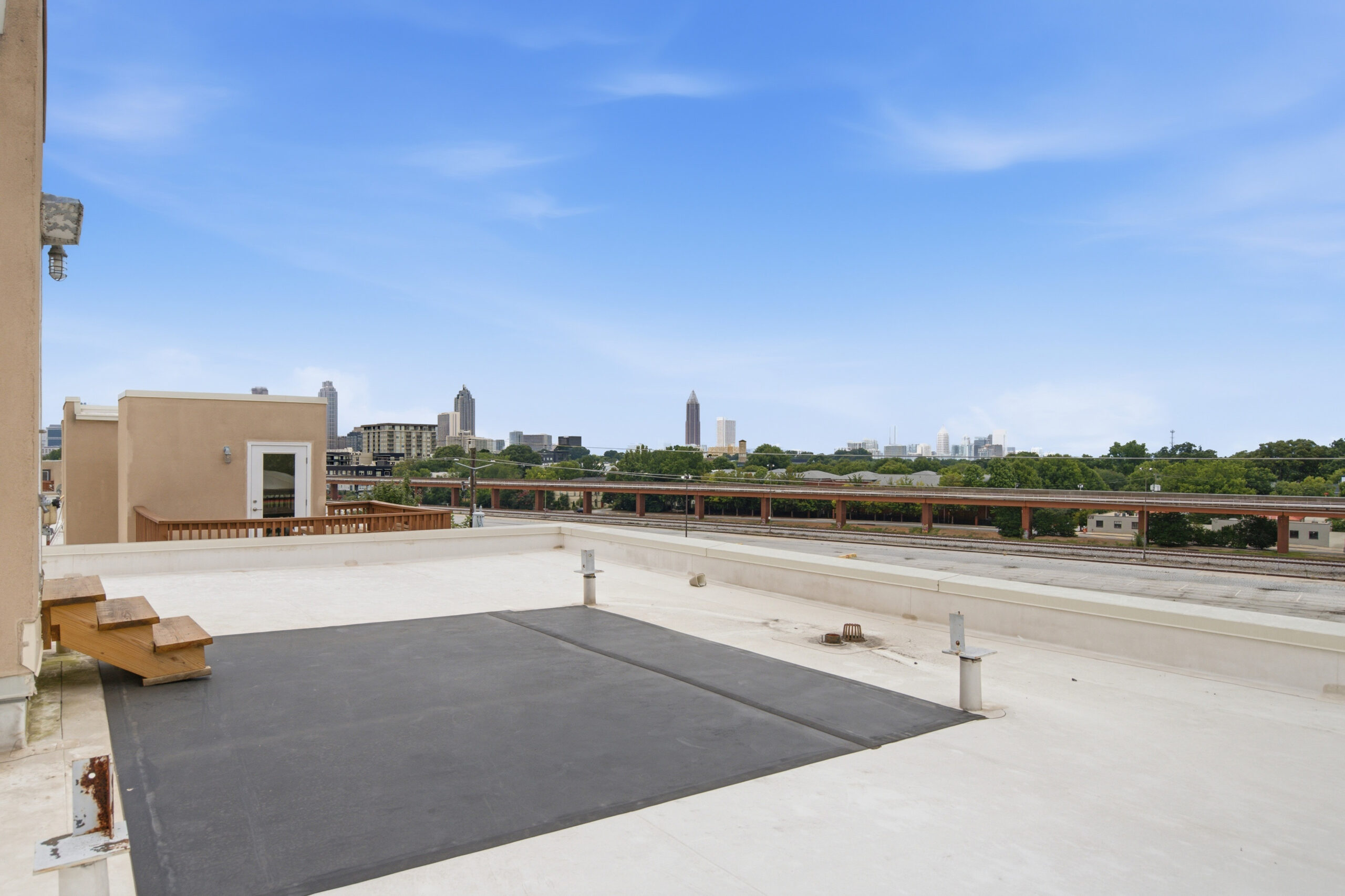 private rooftop deck with downtown Atlanta skyline view at Milltown Lofts Reynoldstown
